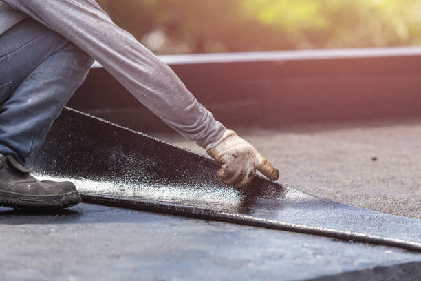Professional Waterproofing technician working in Burket, IN